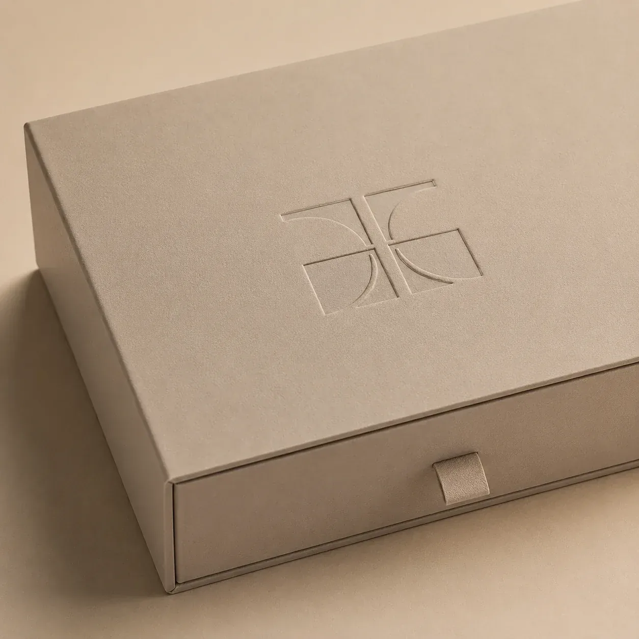 Debossed logo on apparel packaging.
