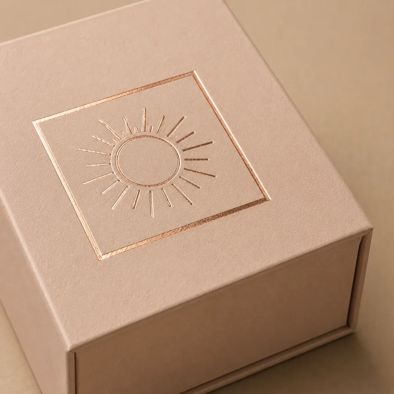 Rose gold foil on premium cosmetics packaging.