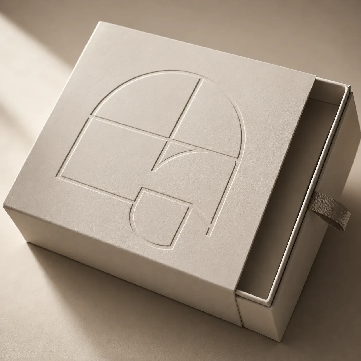 Debossed logo on corporate gift packaging