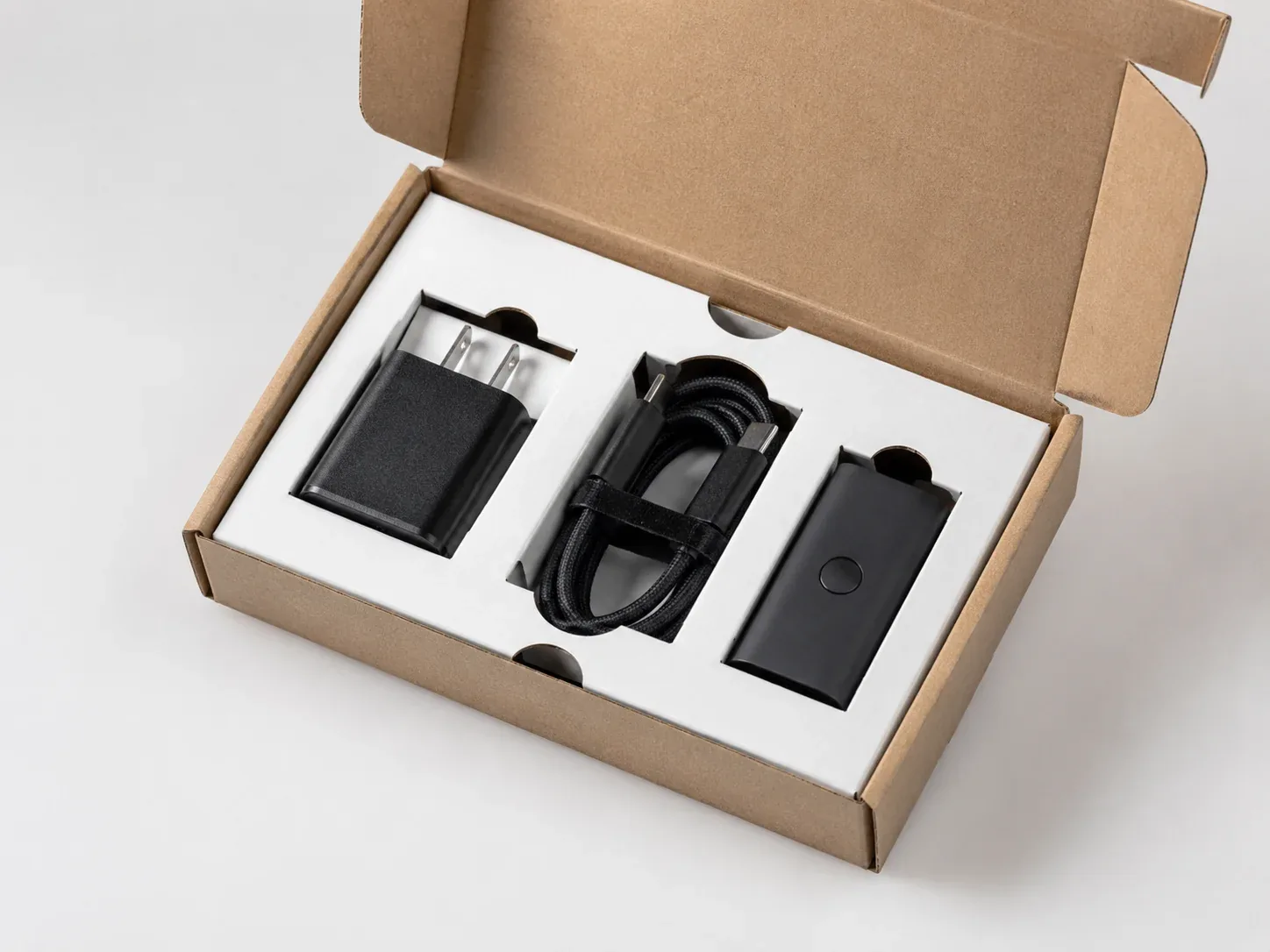 Paperboard insert for compact e-commerce packaging.