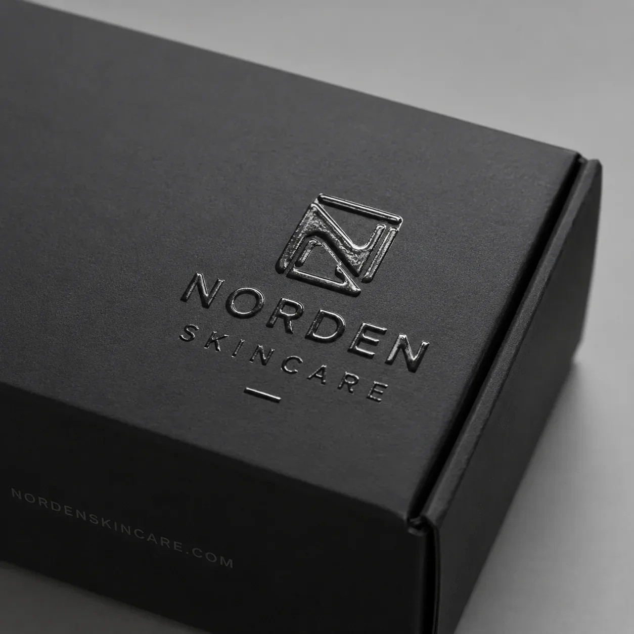 Raised UV effect on e-commerce packaging.
