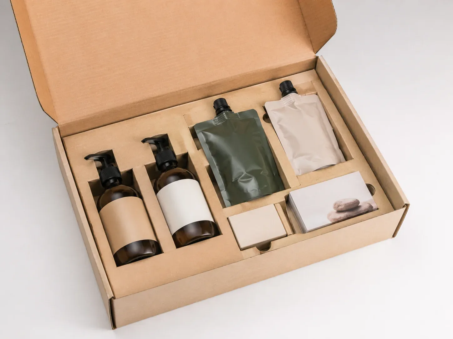 Bundle packaging with organized inserts for e-commerce orders.