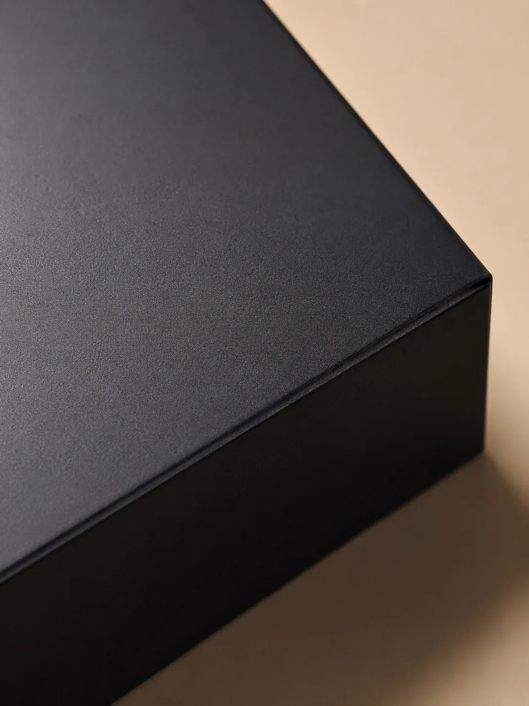 Anti-scratch laminated electronics packaging surface.