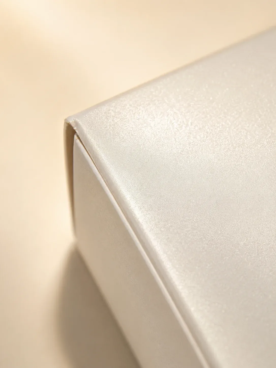 Pearlescent coating on electronics packaging.