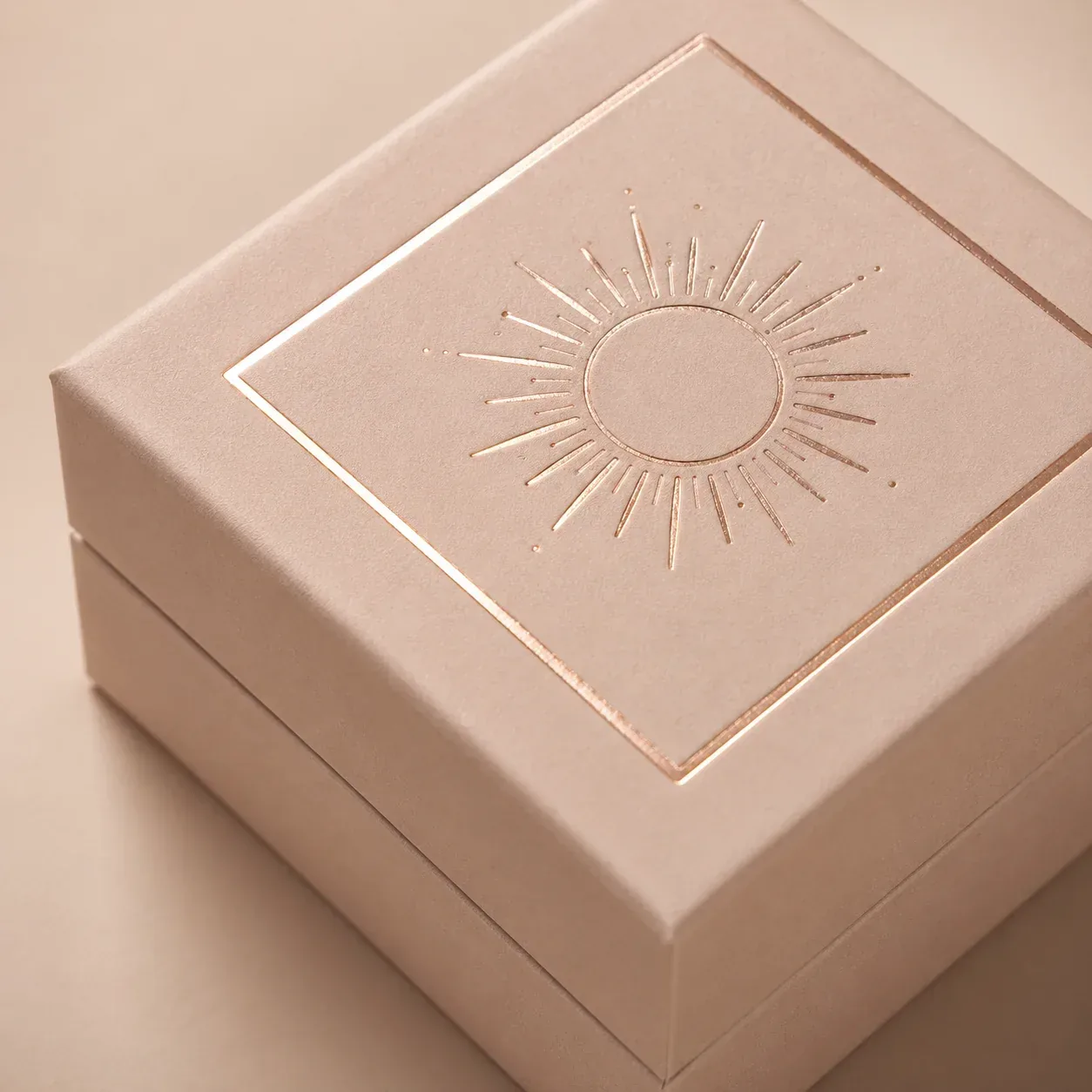 Rose gold foil on premium jewelry packaging.